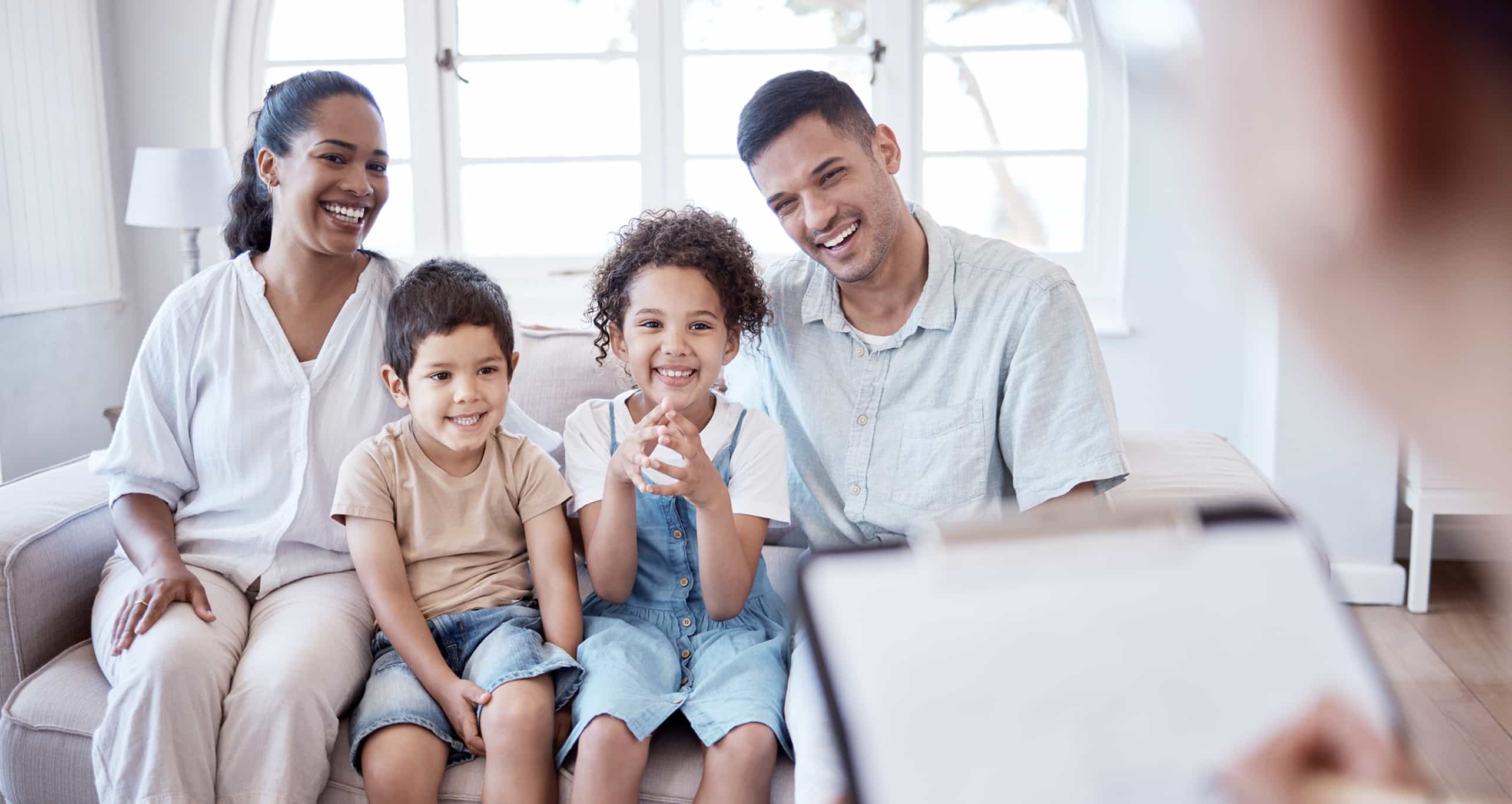 Social Services Header Image featuring family of four